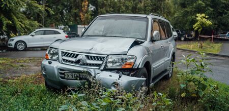 Car after an accident, a torn bumperのeditorial素材