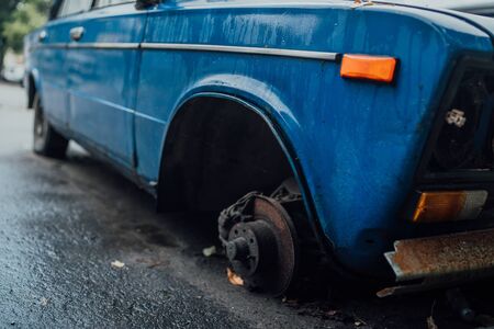 Voronezh, Russia August 17, 2019: Forgotten rusty car on road. Abandoned rusty old car on roadのeditorial素材