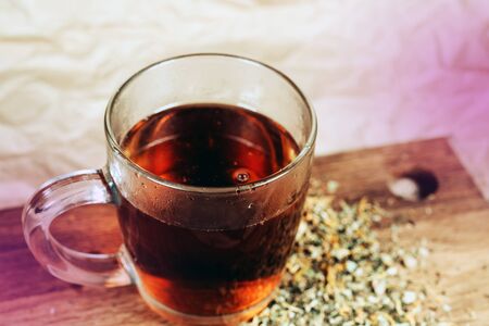 Black tea in a glass mug, hot drinkの写真素材