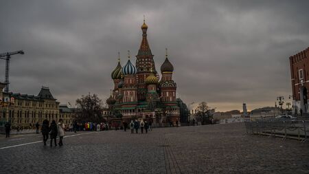 The tower of the Moscow Kremlin against the gray sky
