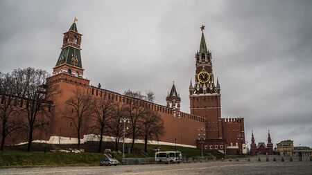The tower of the Moscow Kremlin against the gray sky