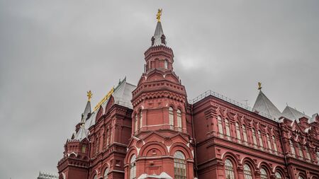 Beautiful historical building in center of old city. Brick structure on cloudy day