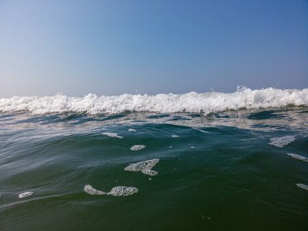 Sea waves on the beach.