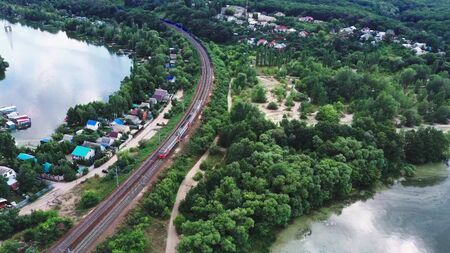 train is moving along the railway in the countrysideの写真素材