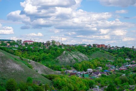 Beautiful landscape of chalk mountains on cloudy day. Hills of chalk in countryside. Residential...