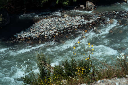 River flowing in mountainous area.