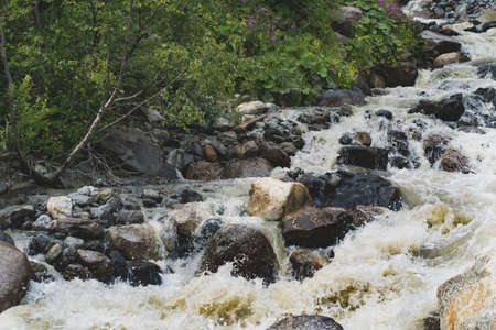 River flowing in mountainous area.