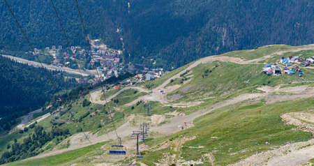 Cableway on mountaintop with benches