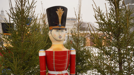 Tin soldier on street in winter time. Close up of figure soldier. Concept of decoration for...