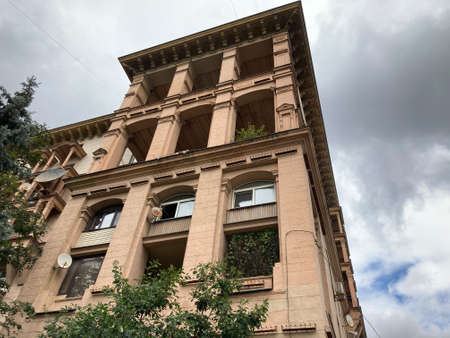 Facade of a multi-storey panel building. Residential building with many apartments. Apartment house,...