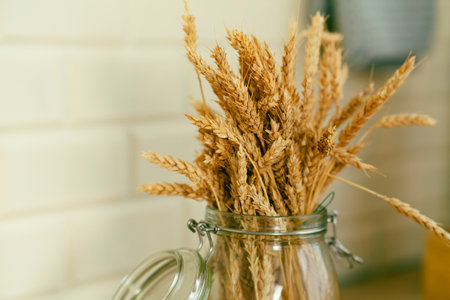 Bouquet of dried wheat. Dried flowers in the room. home decorの写真素材