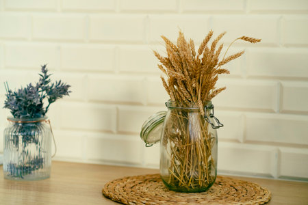 Bouquet of dried wheat. Dried flowers in the room. home decorの写真素材