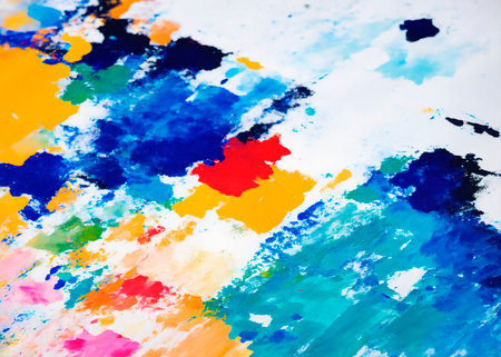 Watercolor background. Blue, red and white paint on paper.の素材