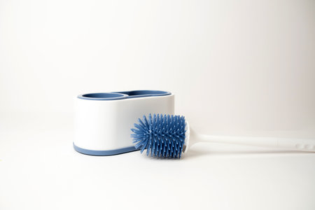 Toilet brush on a white background with space for text. Cleaning concept.の写真素材