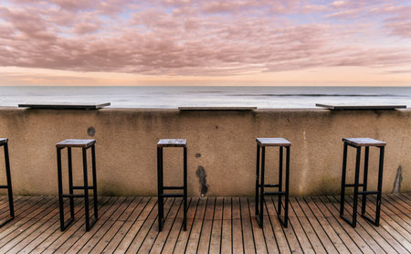 Tranquil Beach View at Sunrise With Empty Tools in a Coastal Setting.の写真素材