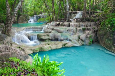 Blue stream waterfall at Erawan waterfall Thailandの写真素材