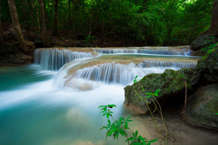 Deep forest waterfall at Erawan waterfall National Park Kanjanaburi Thailandの写真素材