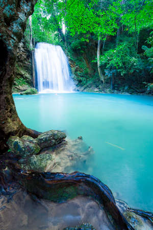 Deep forest waterfall at Erawan waterfall National Park Kanjanaburi Thailandの写真素材
