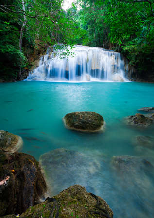 Deep forest waterfall at Erawan waterfall National Park Kanjanaburi Thailandの写真素材