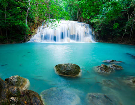 Deep forest waterfall at Erawan waterfall National Park Kanjanaburi Thailandの写真素材