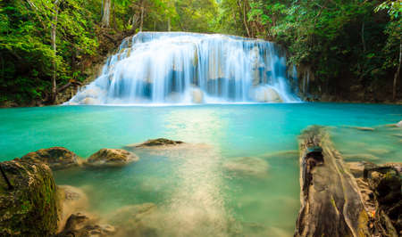 Deep forest waterfall at Erawan waterfall National Park Kanjanaburi Thailandの写真素材