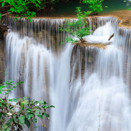 Deep forest waterfall at Erawan waterfall National Park Kanjanaburi Thailandの写真素材