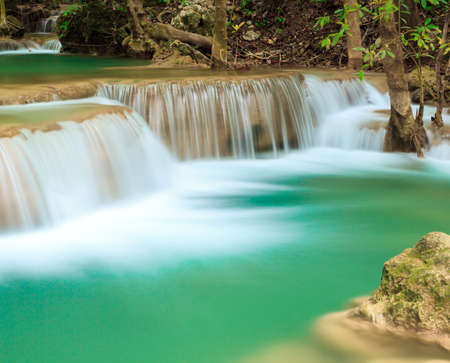 Deep forest waterfall at Erawan waterfall National Park Kanjanaburi Thailandの写真素材