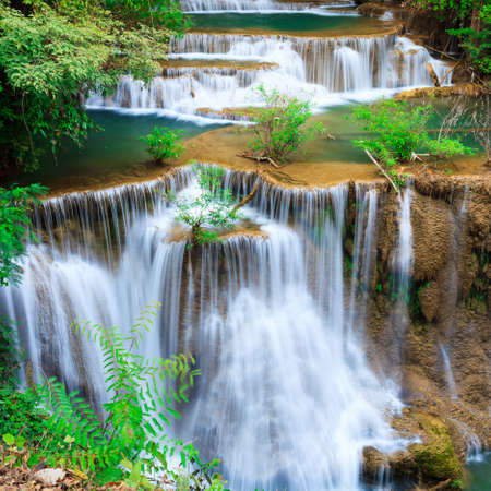 Deep forest waterfall at Erawan waterfall National Park Kanjanaburi Thailandの写真素材