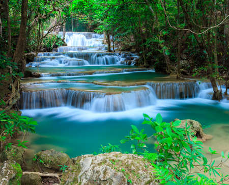 Deep forest waterfall at Erawan waterfall National Park Kanjanaburi Thailandの写真素材