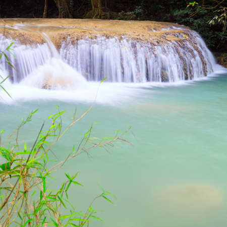 Deep forest waterfall at Erawan waterfall National Park Kanjanaburi Thailandの写真素材