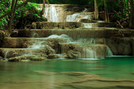Deep forest waterfall in Huay Mae Kamin Kanjanaburi Thailandの写真素材