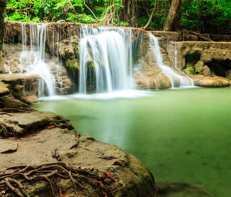 Deep forest waterfall in Huay Mae Kamin Kanjanaburi Thailandの写真素材