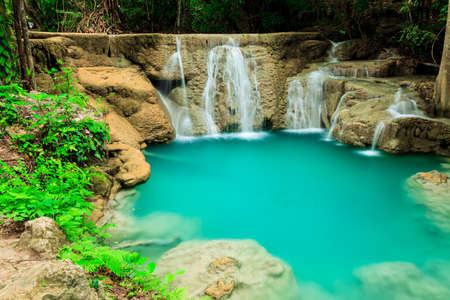 Deep forest waterfall in Huay Mae Kamin Kanjanaburi Thailandの写真素材