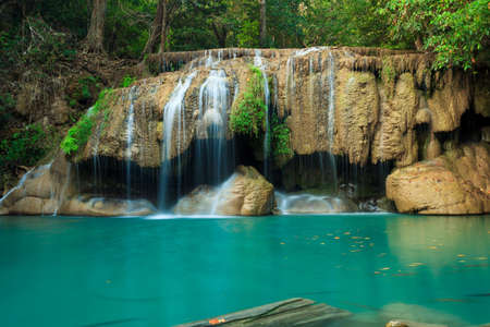 Deep forest waterfall at Erawan waterfall National Park Kanjanaburi Thailandの写真素材