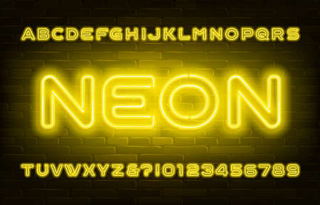 Yellow neon alphabet font. Bright light bubble letters and numbers on brick wall background. Stock vector typescript for your design.のイラスト素材