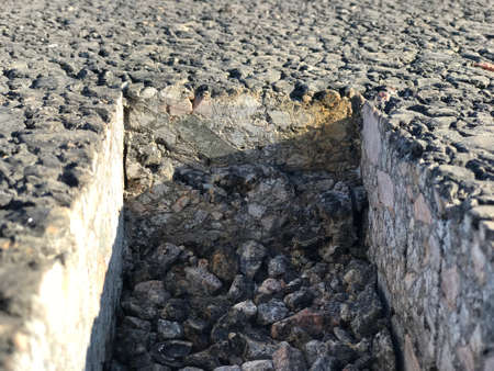 Place of selection of the kernel in the form of a rectangular from asphalt concrete pavement. Kern. Close-upの写真素材