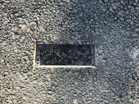 Place of sampling the asphalt coating in the form of a rectangular from asphalt concrete pavement. Kern. Close-upの写真素材