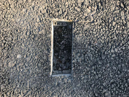 Place of selection of the kernel in the form of a rectangular from asphalt concrete pavement. Kern. Close-upの写真素材