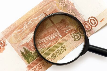 magnifier on banknotes close-upの写真素材