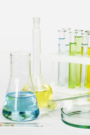 laboratory glassware with colored solutionsの写真素材