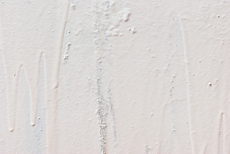 Drips of paint on a wall の写真素材