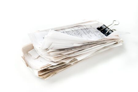 large stack of checks, sealed Binder Clipの写真素材