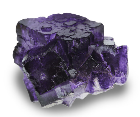 purple fluorite specimen on white 