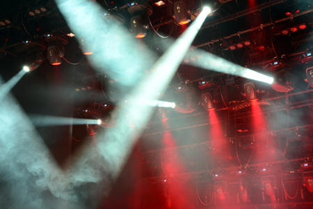 Illuminated empty concert stage with smokeの写真素材