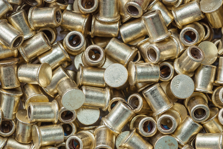 Background of scattered brass hunting primers