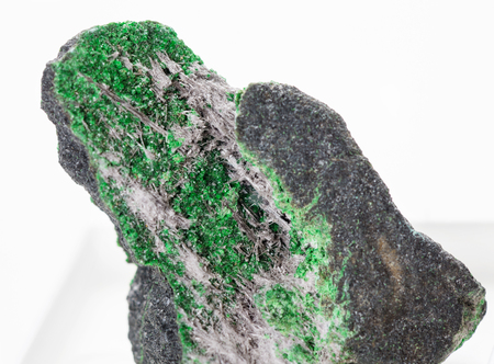 Mineral Shuiskite on green garnet Uvarovite. Saranovskoye deposit, Middle Uralsの写真素材