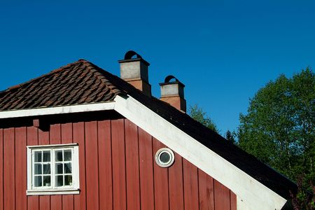 Detail of old, wooden, red house in Baerums Verk, Norway.