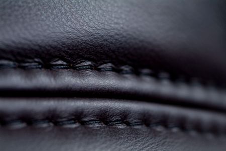 Seam on black leather furniture. Very shallow depth of field.の写真素材