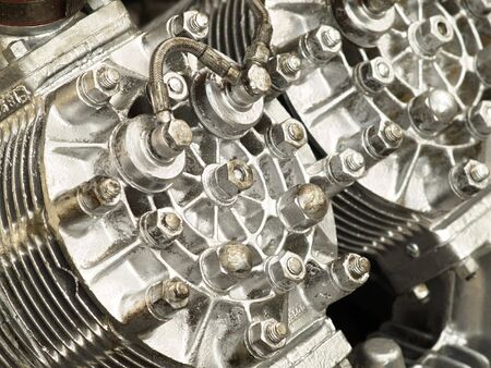 Sylinder head of old, air-cooled engine painted with silver paintの写真素材