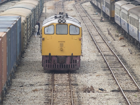 Freight and passenger trains at a railway station in Hat Yai, Thailand.の写真素材